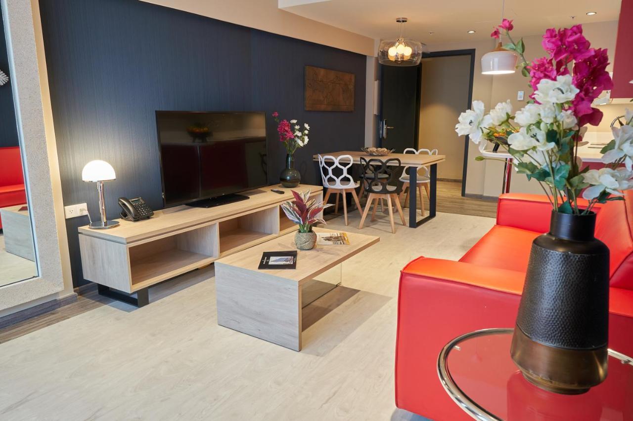 Gran Evenia Panama Hotel Exterior foto A living room in a serviced apartment in Paris, France